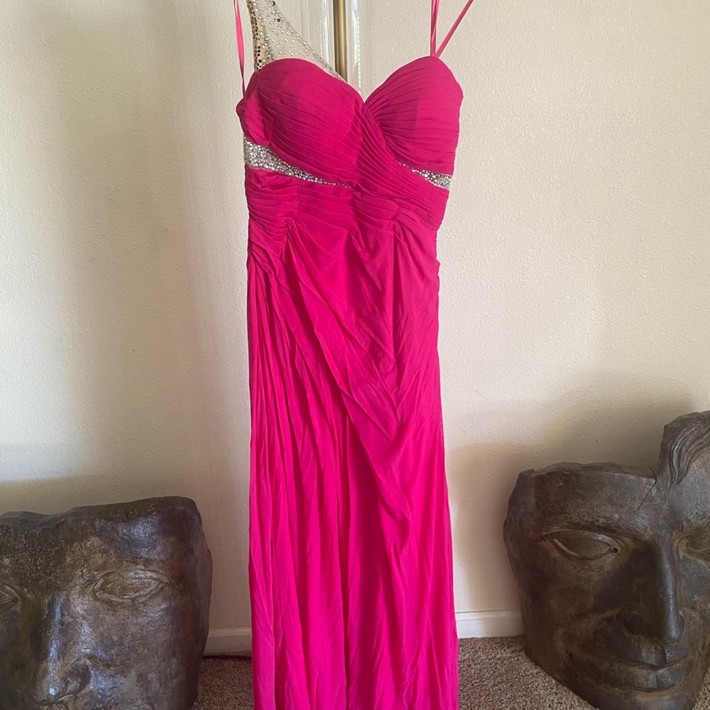 Beautiful evening gown by Caché. Never worn!